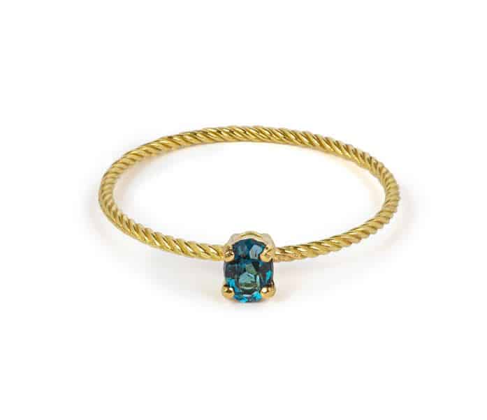 Wouters & Hendrix 18kt Gold twisted Ring with London Blue Topaz RGC010
